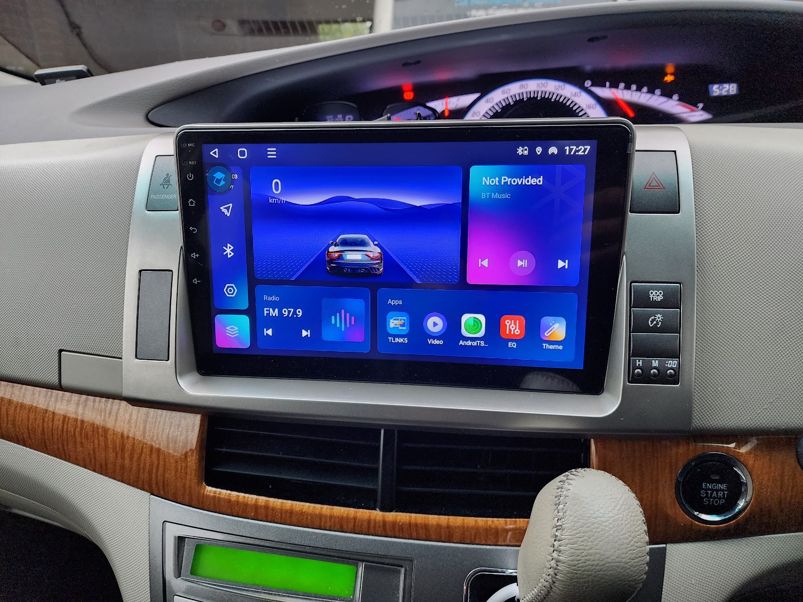 A new touchscreen head unit fitted in a car dashboard
