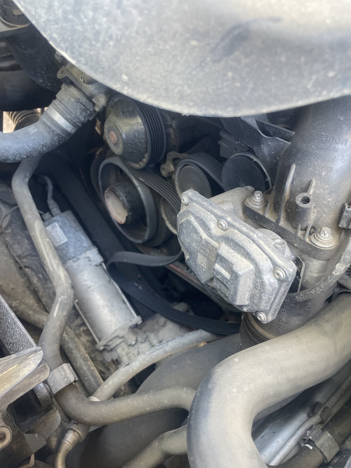 Close-up of an engine bay mid repair